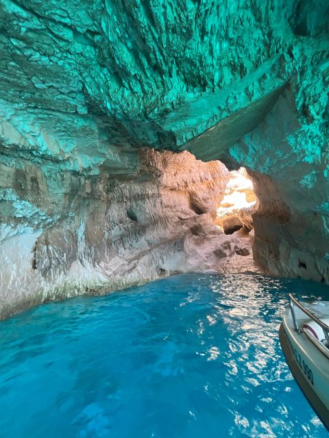 Zakynthos: Glass-Bottom Boat to Navagio, Caves & White Beach - White Beach plus Sfogio: boat-only sand, pebble textures, and built-in play