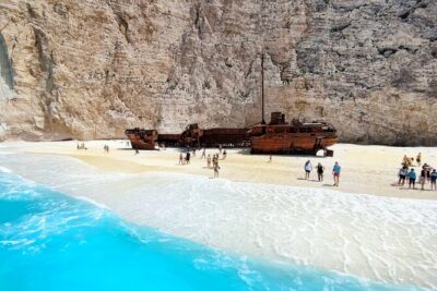 Zakynthos Half day tour Shipwreck beach Blue Caves by small boat - From Agios Nikolaos to Navagio Shipwreck Beach: The Big Moment