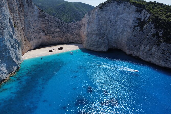 Zakynthos Shipwreck Beach with Blue Caves Land and Sea Tour - Olive tree, tastings, and the one-hour taverna break