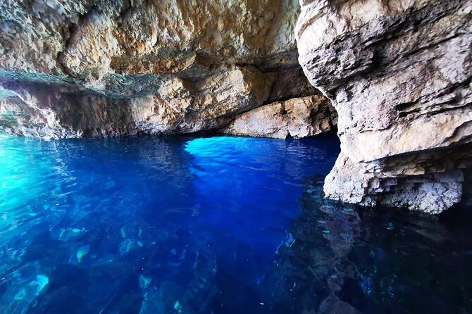 Zakynthos Small Group Tour Shipwreck and Blue Caves Land & Sea - Blue Caves and Maravelia Cave: the swim experience people talk about