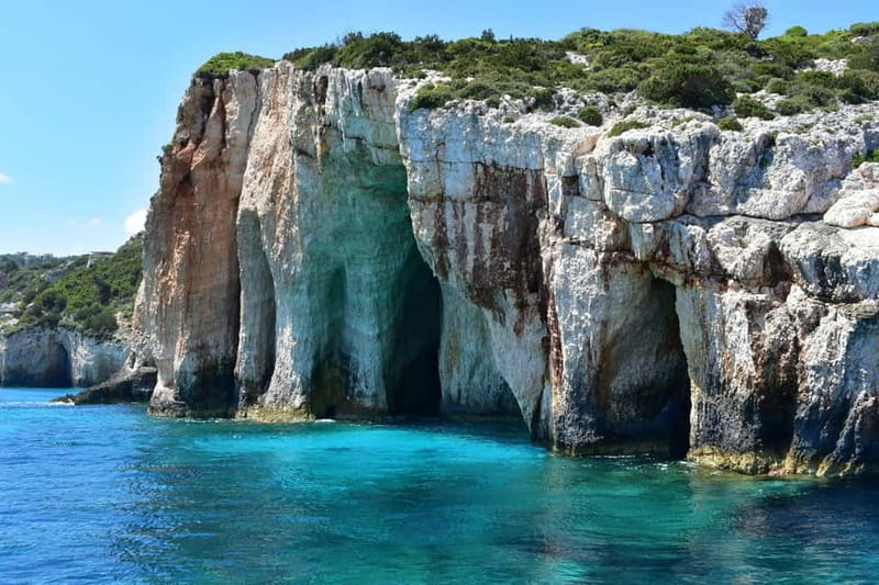 Zakynthos: Xigia, Navagio Shipwreck and Blue Caves Boat Tour - Getting There: Alykes Pier and a Start That Moves