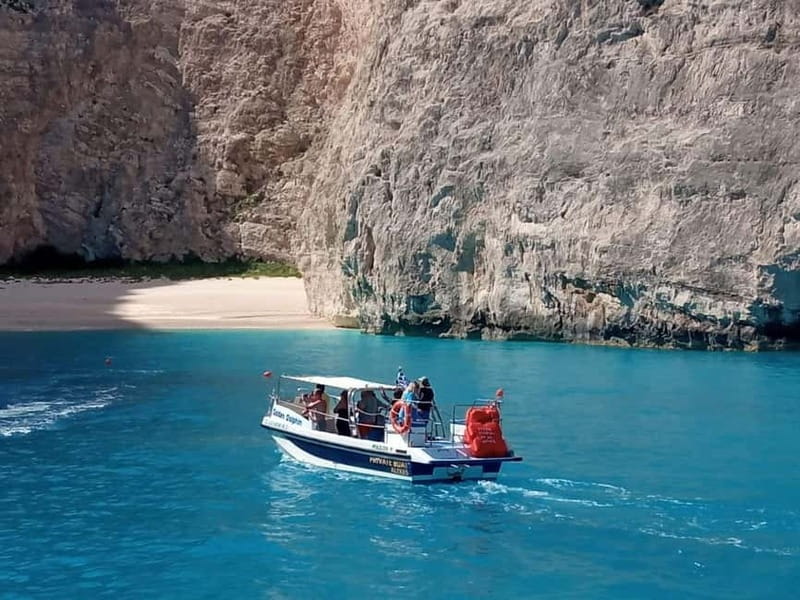Zakynthos: Xigia, Navagio Shipwreck and Blue Caves Boat Tour - A Secret Stop for Swimming in a Wild Bay